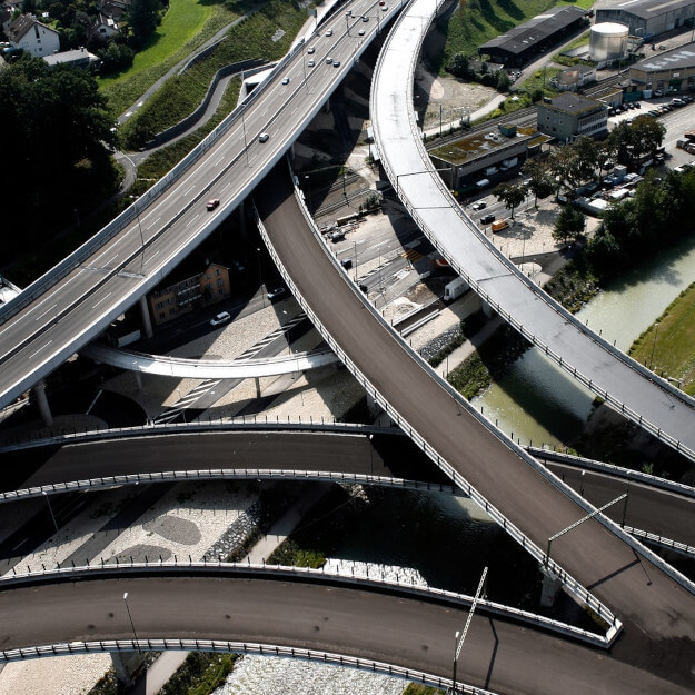 The exchange of two freeways in an urban landscape.